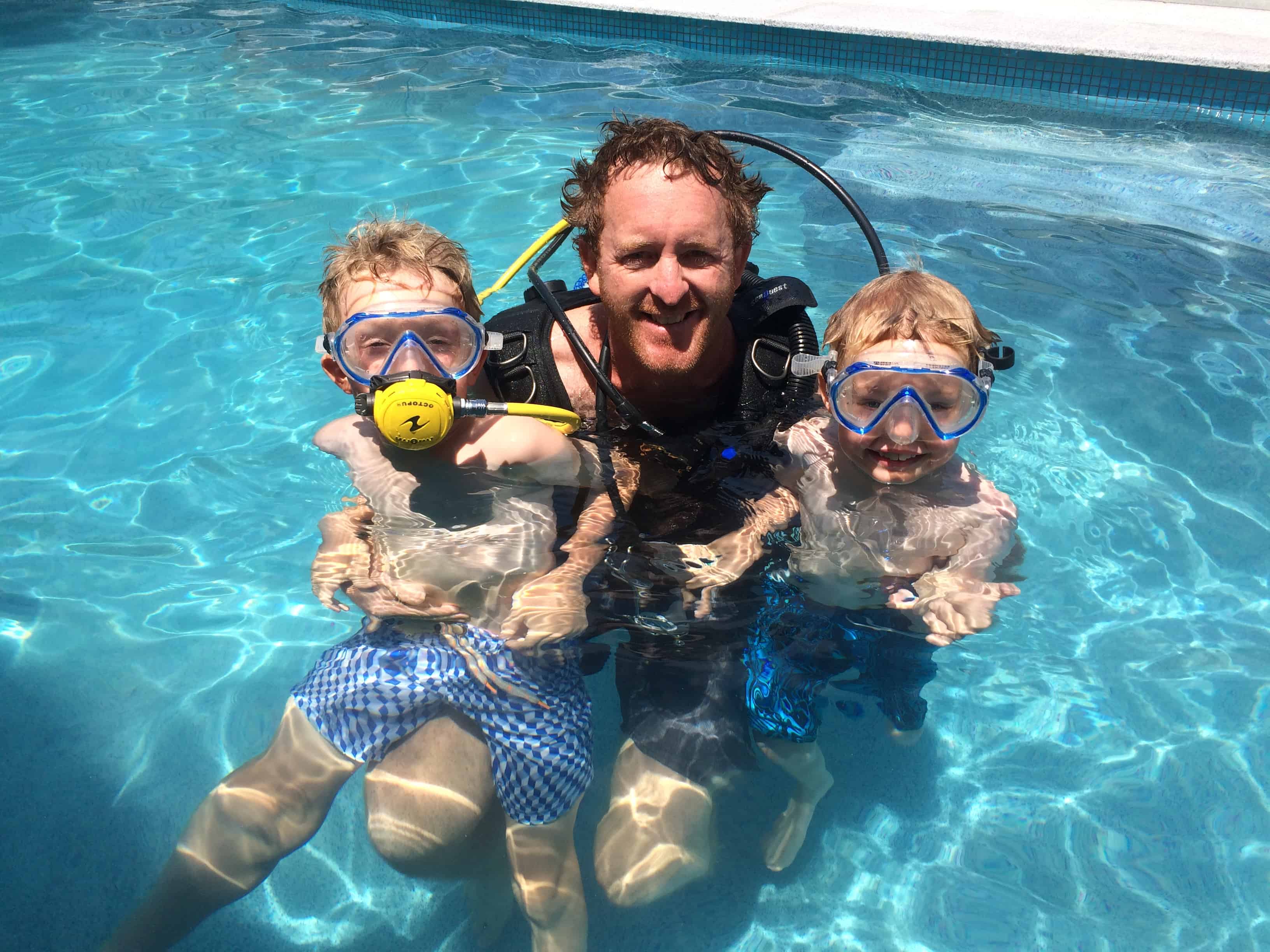 Paul and the boys in the swimming pool learning how to scuba dive