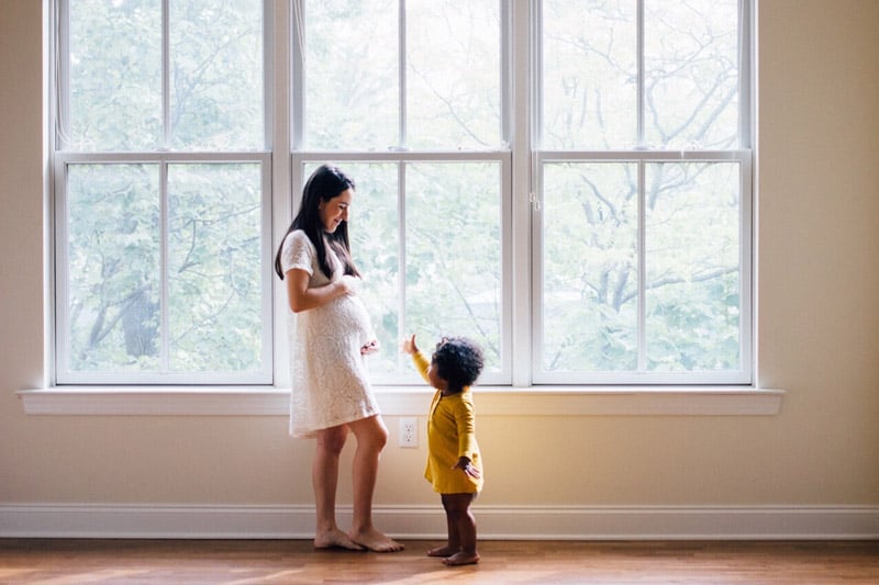 pregnant woman and child